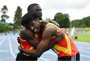 30 June 2024; Israel Olatunde of Tallaght AC, left, is congratulated by team-mate Sean Aigboboh after winning the men's 100m during day two of the 123.ie National Outdoor Senior Championships at Morton Stadium in Santry, Dublin. Photo by Sam Barnes/Sportsfile