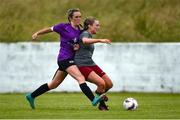30 June 2024; Caoimhe O Neill of Galway is tackled by Hannah Kehoe of Wexford and District during the FAI Women's Under 19 Inter-League Cup final match between Wexford Women’s Schoolgirls Soccer League and Galway District League at Jackman Park in Limerick. Photo by Tom Beary/Sportsfile