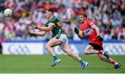 30 June 2024; Diarmuid O'Connor of Kerry in action against Brendan Rogers of Derry during the GAA Football All-Ireland Senior Championship quarter-final match between Kerry and Derry at Croke Park in Dublin. Photo by Shauna Clinton/Sportsfile