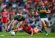 30 June 2024; Jason Foley of Kerry and Shane McGuigan of Derry compete for possession during the GAA Football All-Ireland Senior Championship quarter-final match between Kerry and Derry at Croke Park in Dublin. Photo by Brendan Moran/Sportsfile
