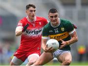 30 June 2024; Sean O'Shea of Kerry in action against Gareth McKinless of Derry during the GAA Football All-Ireland Senior Championship quarter-final match between Kerry and Derry at Croke Park in Dublin. Photo by John Sheridan/Sportsfile