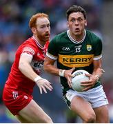 30 June 2024; David Clifford of Kerry is tackled by Conor Glass of Derry during the GAA Football All-Ireland Senior Championship quarter-final match between Kerry and Derry at Croke Park in Dublin. Photo by Shauna Clinton/Sportsfile
