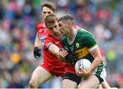 30 June 2024; Paul Geaney of Kerry in action against Brendan Rogers of Derry during the GAA Football All-Ireland Senior Championship quarter-final match between Kerry and Derry at Croke Park in Dublin. Photo by John Sheridan/Sportsfile