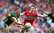 30 June 2024; Paul Geaney of Kerry in action against Eoin McEvoy of Derry during the GAA Football All-Ireland Senior Championship quarter-final match between Kerry and Derry at Croke Park in Dublin. Photo by John Sheridan/Sportsfile