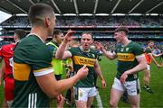 30 June 2024; Kerry players, from left, Joe O'Connor, Tadhg Morley and Cillian Burke celebrate after the GAA Football All-Ireland Senior Championship quarter-final match between Kerry and Derry at Croke Park in Dublin. Photo by Brendan Moran/Sportsfile