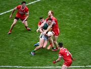 30 June 2024; David Clifford of Kerry is fouled by Conor Glass of Derry, right, during the GAA Football All-Ireland Senior Championship quarter-final match between Kerry and Derry at Croke Park in Dublin. Photo by Piaras Ó Mídheach/Sportsfile