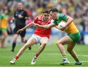 30 June 2024; Caolan McColgan of Donegal in action against Tadhg McDonnell of Louth Football All-Ireland Senior Championship quarter-final match between Donegal and Louth at Croke Park in Dublin. Photo by John Sheridan/Sportsfile
