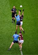 29 June 2024; Brian Fenton of Dublin and Paul Conroy of Galway look on as James McCarthy and Matthew Tierney jump for the ball after referee Sean Hurson had thrown it in to start the GAA Football All-Ireland Senior Championship quarter-final match between Dublin and Galway at Croke Park in Dublin. Photo by Ray McManus/Sportsfile