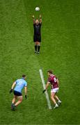 29 June 2024; Brian Fenton of Dublin and Paul Conroy of Galway get ready as referee Sean Hurson throws the ball in to start the GAA Football All-Ireland Senior Championship quarter-final match between Dublin and Galway at Croke Park in Dublin. Photo by Ray McManus/Sportsfile