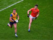 29 June 2024; Enda Smith of Roscommon in action against Ben Crealey of Armagh during the GAA Football All-Ireland Senior Championship quarter-final match between Armagh and Roscommon at Croke Park in Dublin. Photo by Ray McManus/Sportsfile