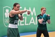 2 July 2024; Boxer Michaela Walsh, left, with training partner Riona Devine of Dukes Boxing Club, Tyrone, during the Team Ireland Open Training Day ahead of the Paris 2024 Olympic Games at the National Indoor Arena on the Sport Ireland Campus in Dublin. Photo by Sam Barnes/Sportsfile