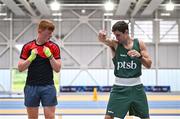 2 July 2024; Boxer Aidan Walsh, right, with Michael Kane from Monivea Boxing Club, Galway, during the Team Ireland Open Training Day ahead of the Paris 2024 Olympic Games at the National Indoor Arena on the Sport Ireland Campus in Dublin. Photo by Sam Barnes/Sportsfile