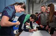 2 July 2024; Boxers Michaela Walsh and Aidan Walsh sign autographs for attendees during the Team Ireland Open Training Day ahead of the Paris 2024 Olympic Games at the National Indoor Arena on the Sport Ireland Campus in Dublin. Photo by Sam Barnes/Sportsfile