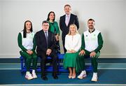 3 July 2024; In attendance at an Olympic Federation of Ireland and Sport Ireland media conference ahead of the Paris 2024 Olympic Games are, back row, from left, Minister for Tourism, Culture, Arts, Gaeltacht, Sport and Media Catherine Martin TD, Minister of State for Sport and Physical Education Thomas Byrne TD, front row, from left, swimmer Victoria Catterson, Sport Ireland chairperson John Foley, OFI president and Swim Ireland chief executive Sarah Keane, and rugby sevens player Harry McNulty, at the Sport Ireland Institute on the Sport Ireland Campus in Dublin. Photo by Seb Daly/Sportsfile