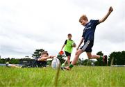 3 July 2024; Daithí Martin, right, during the Bank of Ireland Leinster Rugby summer camp at Wexford Wanderers RFC in Wexford. Photo by Tyler Miller/Sportsfile