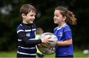 3 July 2024; Charlotte Pittick and Ben Pinchedez during the Bank of Ireland Leinster Rugby summer camp at Wexford Wanderers RFC in Wexford. Photo by Shauna Clinton/Sportsfile