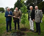 3 July 2024; Members of Blackrock GAA Club during the planting of an oak tree at the Launch of Clann of Gaelic Games exhibition at Phoenix Park visitor centre marking the 140, 120 and 50 anniversaries of the GAA, Camogie and LGFA and unveiling a plaque to mark the venue of the 1893 GAA All-Ireland finals in the Park. Photo by Harry Murphy/Sportsfile