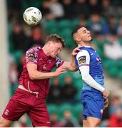 4 July 2024; Dean Larkin of Cobh Ramblers in action against Yoyo Mahdy of Treaty United during the SSE Airtricity Men's First Division match between Treaty United and Cobh Ramblers at Markets Field in Limerick. Photo by Michael P Ryan/Sportsfile