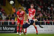 4 July 2024; Patrick Hoban of Derry City attempts an overhead kick despite the attention of John Ross Wilson of Sligo Rovers during the SSE Airtricity Men's Premier Division match between Sligo Rovers and Derry City at The Showgrounds in Sligo. Photo by Harry Murphy/Sportsfile