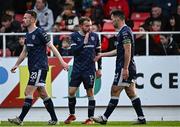 4 July 2024; Paul McMullan of Derry City, centre, celebrates with Patrick Hoban after scoring his side's first goal  during the SSE Airtricity Men's Premier Division match between Sligo Rovers and Derry City at The Showgrounds in Sligo. Photo by Harry Murphy/Sportsfile