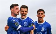 4 July 2024; Ben McCormack of Waterford, left, celebrates with team-mates Darragh Leahy, centre, and Dean McMenany after scoring their side's first goal during the SSE Airtricity Men's Premier Division match between Waterford and St Patrick's Athletic at the Regional Sports Centre in Waterford. Photo by Tyler Miller/Sportsfile