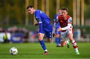 4 July 2024; Ben McCormack of Waterford in action against Chris Forrester of St Patrick's Athletic during the SSE Airtricity Men's Premier Division match between Waterford and St Patrick's Athletic at the Regional Sports Centre in Waterford. Photo by Tyler Miller/Sportsfile