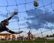 4 July 2024; Douglas James-Taylor of Drogheda United scores his side's first goal, a penalty, past Shelbourne goalkeeper Conor Kearns during the SSE Airtricity Men's Premier Division match between Drogheda United and Shelbourne at Weavers Park in Drogheda, Louth. Photo by Stephen McCarthy/Sportsfile