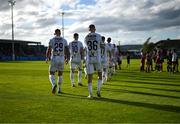 4 July 2024; Will Jarvis, 36, Paddy Barrett, 19, and the Shelbourne players walk out before the SSE Airtricity Men's Premier Division match between Drogheda United and Shelbourne at Weavers Park in Drogheda, Louth. Photo by Stephen McCarthy/Sportsfile