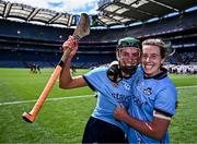 6 July 2024; Dublin players Aoife McKearney, left, and Sinéad Wylde celebrate after their side's victory in during the Glen Dimplex Senior All-Ireland Championship quarter-final match between Kilkenny and Dublin at Croke Park in Dublin. Photo by Piaras Ó Mídheach/Sportsfile