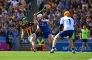 6 July 2024; Eoin Cody of Kilkenny runs past Adam Hogan of Clare on his way to scoring a goal during the GAA Hurling All-Ireland Senior Championship semi-final match between Kilkenny and Clare at Croke Park in Dublin. Photo by Ray McManus/Sportsfile
