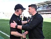6 July 2024; Clare manager Brian Lohan, left, shakes hands with Kilkenny manager Derek Lyng shake hands after the GAA Hurling All-Ireland Senior Championship semi-final match between Kilkenny and Clare at Croke Park in Dublin. Photo by Piaras Ó Mídheach/Sportsfile