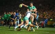 6 July 2024; James Lowe of Ireland offloads in the tackle by Jesse Kriel and Cheslin Kolbe of South Africa, in the lead up to Ireland's first try, during the first test between South Africa and Ireland at Loftus Versfeld Stadium in Pretoria, South Africa. Photo by Brendan Moran/Sportsfile