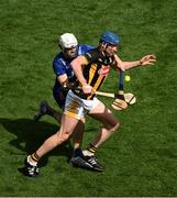 6 July 2024; John Donnelly of Kilkenny in action against Aidan McCarthy of Clare during the GAA Hurling All-Ireland Senior Championship semi-final match between Kilkenny and Clare at Croke Park in Dublin. Photo by Daire Brennan/Sportsfile