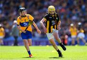 6 July 2024; Harry Brennan, St Aidan's National School, Kilmanagh, Kilkenny, a son of Eddie, goes past Cillian Casey, Toureen national School, Ballyhaunis, Co Mayo, representing Clare, during the GAA INTO Cumann na mBunscol Respect Exhibition Go Games at the GAA Hurling All-Ireland Senior Championship semi-final match between Kilkenny and Clare at Croke Park in Dublin. Photo by Ray McManus/Sportsfile