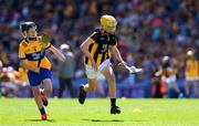 6 July 2024; Harry Brennan, St Aidan's National School, Kilmanagh, Kilkenny, a son of Eddie, goes past Cillian Casey, Toureen national School, Ballyhaunis, Co Mayo, representing Clare, during the GAA INTO Cumann na mBunscol Respect Exhibition Go Games at the GAA Hurling All-Ireland Senior Championship semi-final match between Kilkenny and Clare at Croke Park in Dublin. Photo by Ray McManus/Sportsfile