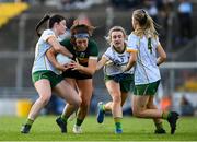 6 July 2024; Emma Dineen of Kerry is tackled by Meath players, from left, Shelly Melia, Mary Kate Lynch and Nicole Troy during the TG4 All-Ireland Ladies Football Senior Championship quarter-final match between Kerry and Meath at Austin Stack Park in Tralee, Kerry. Photo by Tyler Miller/Sportsfile