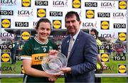 6 July 2024; Anna Galvin of Kerry is presented with the player of the match award by Uachtarán Cumann Peil Gael na mBan, Mícheál Naughton after the TG4 All-Ireland Ladies Football Senior Championship quarter-final match between Kerry and Meath at Austin Stack Park in Tralee, Kerry. Photo by Tyler Miller/Sportsfile