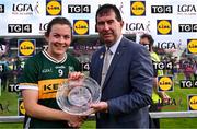 6 July 2024; Anna Galvin of Kerry is presented with the player of the match award by Uachtarán Cumann Peil Gael na mBan, Mícheál Naughton after the TG4 All-Ireland Ladies Football Senior Championship quarter-final match between Kerry and Meath at Austin Stack Park in Tralee, Kerry. Photo by Tyler Miller/Sportsfile