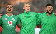 6 July 2024; Ireland players, from left, James Lowe, Jamie Osborne and Robbie Henshaw during the national anthems before the first test between South Africa and Ireland at Loftus Versfeld Stadium in Pretoria, South Africa. Photo by Brendan Moran/Sportsfile