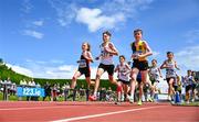 7 July 2024; Athletes, from left, Dylan O'Reilly of Shercock A.C., Cavan, Killian Coman, Limerick A.C., Limerick and Daniel Greene of Kilkenny City Harriers A.C., Kilkenny, compete in the Boys Under 13s 600m final during day one of the 123.ie National Juvenile Track and Field Championships at Tullamore in Offaly. Photo by Tyler Miller/Sportsfile