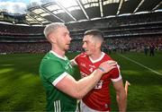 7 July 2024; Sean O'Donoghue of Cork and Cian Lynch of Limerick after the GAA Hurling All-Ireland Senior Championship semi-final match between Limerick and Cork at Croke Park in Dublin. Photo by Stephen McCarthy/Sportsfile