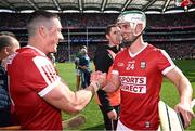 7 July 2024; Cork players Seán O'Donoghue, left, and Shane Kingston celebrate after their side's victory in the GAA Hurling All-Ireland Senior Championship semi-final match between Limerick and Cork at Croke Park in Dublin. Photo by Seb Daly/Sportsfile
