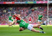 7 July 2024; Brian Hayes of Cork is tackled by Sean Finn of Limerick during the GAA Hurling All-Ireland Senior Championship semi-final match between Limerick and Cork at Croke Park in Dublin. Photo by Stephen McCarthy/Sportsfile