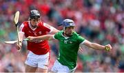 7 July 2024; David Reidy of Limerick in action against Robert Downey of Cork during the GAA Hurling All-Ireland Senior Championship semi-final match between Limerick and Cork at Croke Park in Dublin. Photo by Stephen McCarthy/Sportsfile