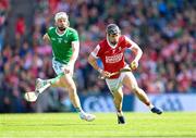 7 July 2024; Darragh Fitzgibbon of Cork in action against Cian Lynch of Limerick during the GAA Hurling All-Ireland Senior Championship semi-final match between Limerick and Cork at Croke Park in Dublin. Photo by Stephen McCarthy/Sportsfile
