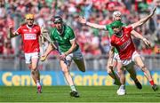 7 July 2024; Diarmaid Byrnes of Limerick in action against Séamus Harnedy of Cork during the GAA Hurling All-Ireland Senior Championship semi-final match between Limerick and Cork at Croke Park in Dublin. Photo by Seb Daly/Sportsfile