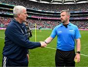 7 July 2024; Limerick manager John Kiely with referee Thomas Walsh before the GAA Hurling All-Ireland Senior Championship semi-final match between Limerick and Cork at Croke Park in Dublin. Photo by Ray McManus/Sportsfile