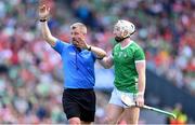 7 July 2024; Referee Thomas Walsh and Cian Lynch of Limerick during the GAA Hurling All-Ireland Senior Championship semi-final match between Limerick and Cork at Croke Park in Dublin. Photo by Stephen McCarthy/Sportsfile