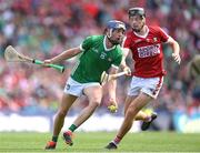 7 July 2024; David Reidy of Limerick and Eoin Downey of Cork during the GAA Hurling All-Ireland Senior Championship semi-final match between Limerick and Cork at Croke Park in Dublin. Photo by Stephen McCarthy/Sportsfile