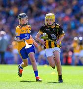 6 July 2024; Harry Brennan, St Aidan's NS, Kilmanagh, Kilkenny, representing Kilkenny in action against Cillian Casey, Toreen NS, Mayo, representing Clare during the GAA INTO Cumann na mBunscol Respect Exhibition Go Games at the GAA Hurling All-Ireland Senior Championship semi-final match between Kilkenny and Clare at Croke Park in Dublin. Photo by Ray McManus/Sportsfile